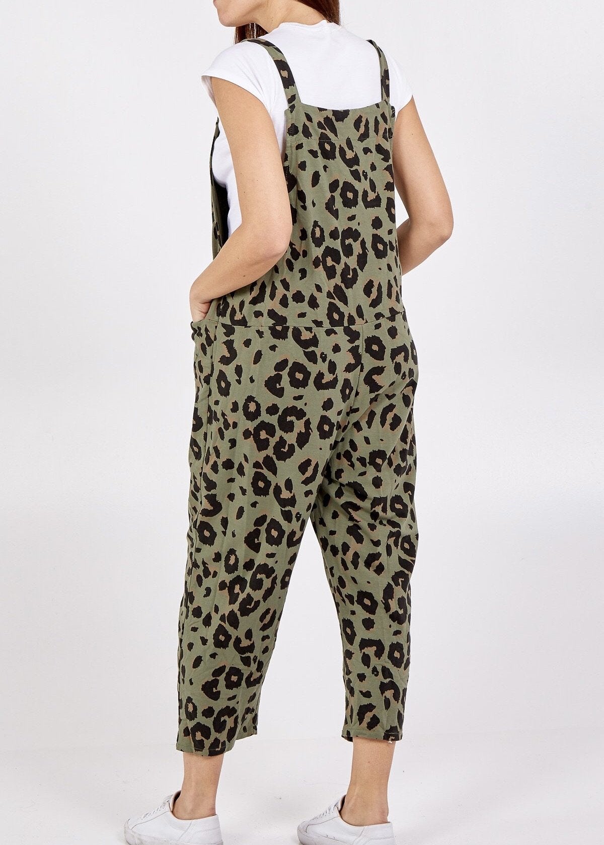 Showing the back of the Porthleven Dungarees in khaki with a leopard print pattern 