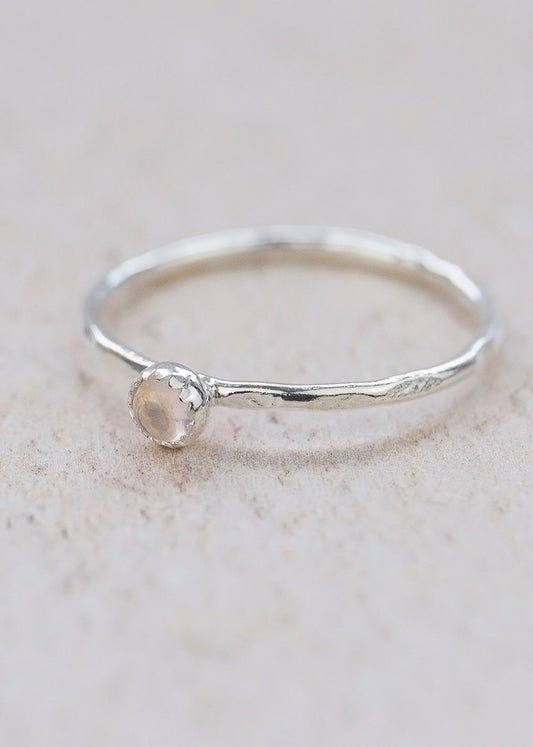 Lucy Kemp Rose Quartz sterling silver stacker ring. Gem stone is aprox 3mm on a hammered silver ring
