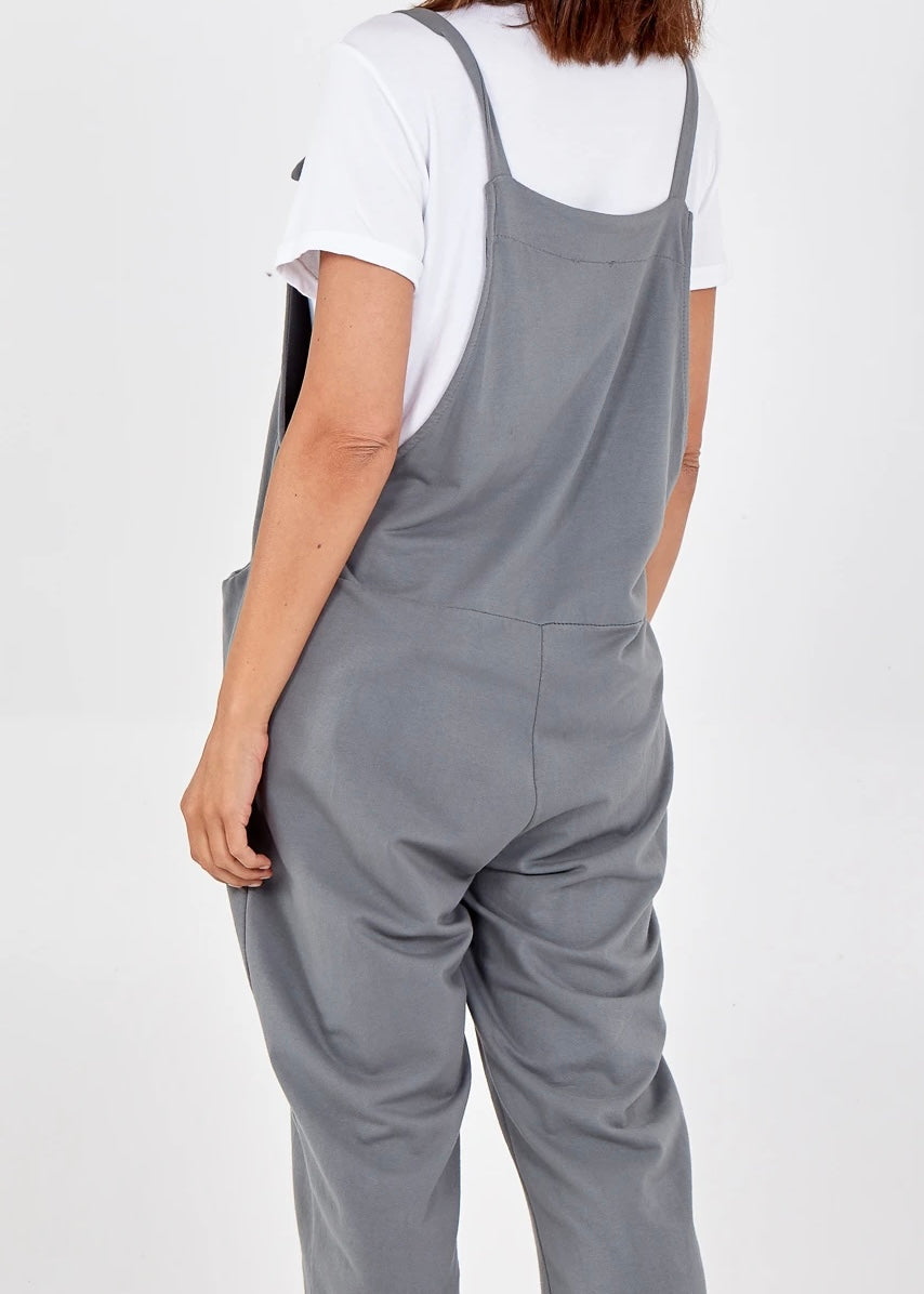 Plain jersey dungarees with tie straps showing the back in mid grey