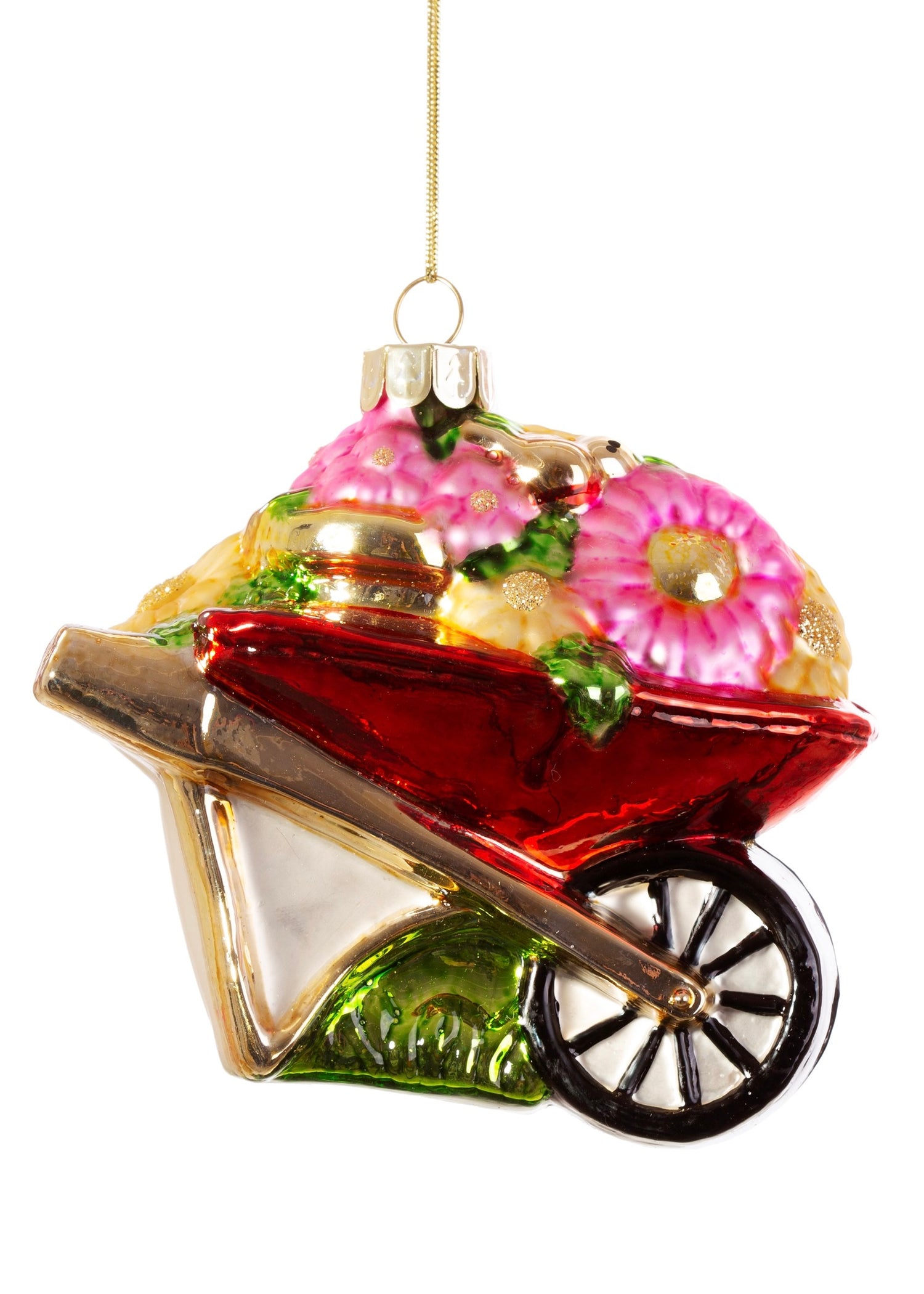 Red wheelbarrow filled with pink and yellow flowers 