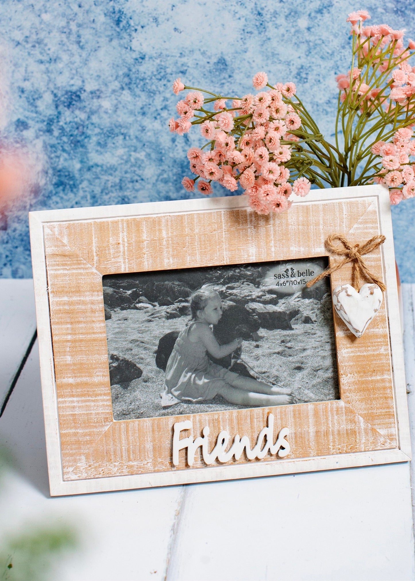 Rustic wooden frame with dangle heart and friends design