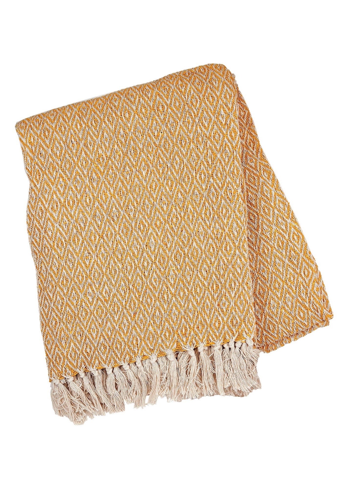 Mustard coloured throw with diamond pattern and tassles