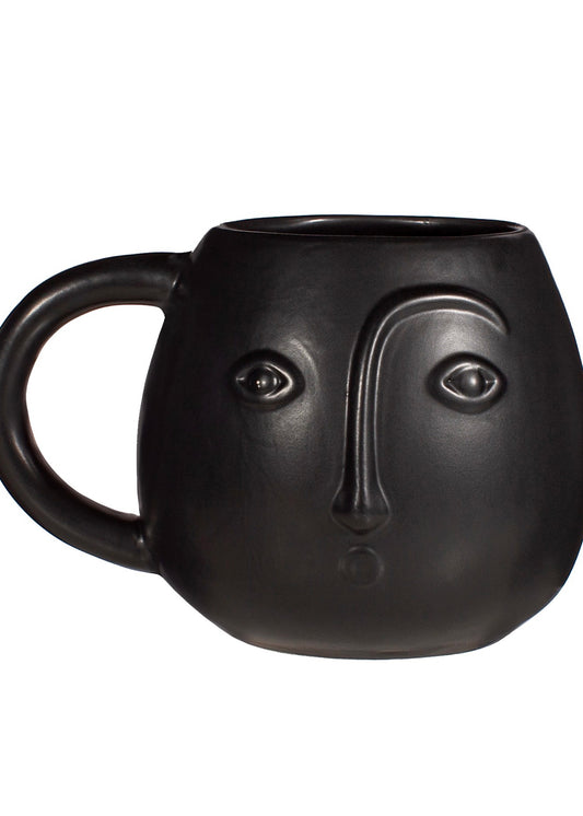 Black mug with face details 