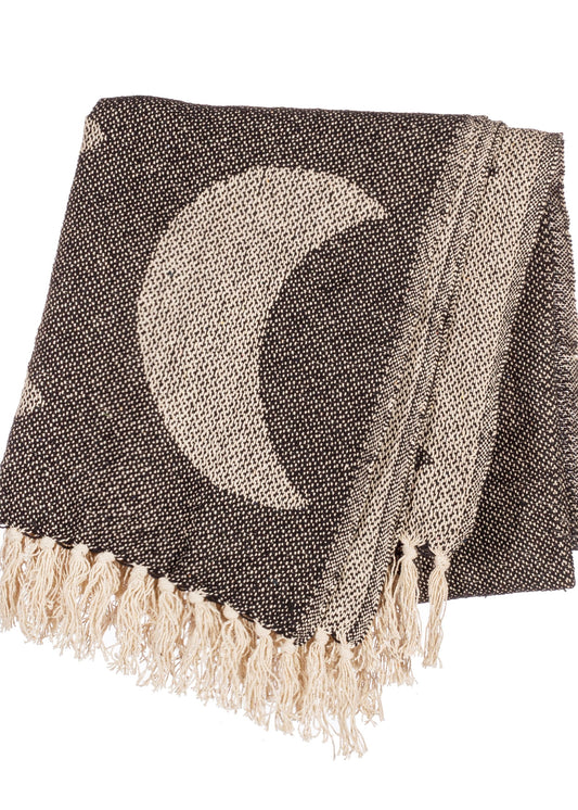 Black and cream throw with moon pattern